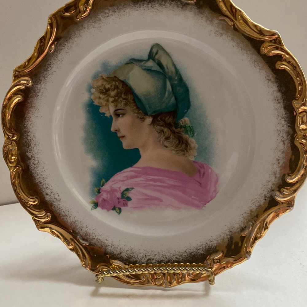 Vintage gold gilded porcelain plate.